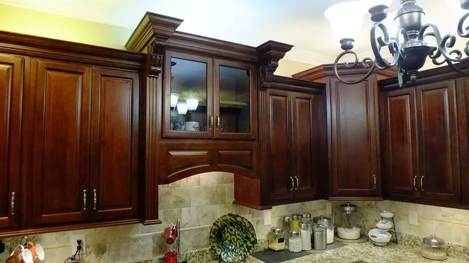 Charlton kitchen cabinets with custom backsplash design