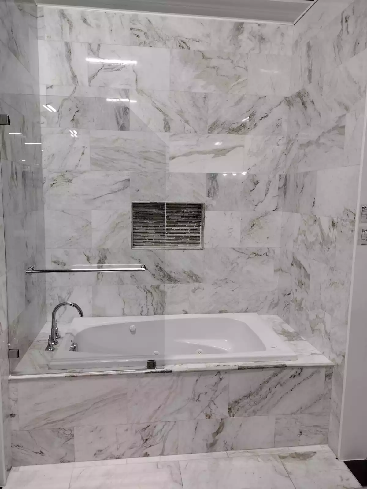 Bathroom renovation with glass door for shower and bath tub