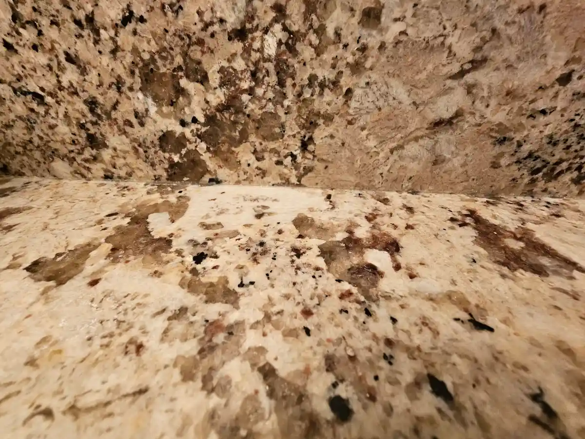 Granite countertop on bathroom vanity.