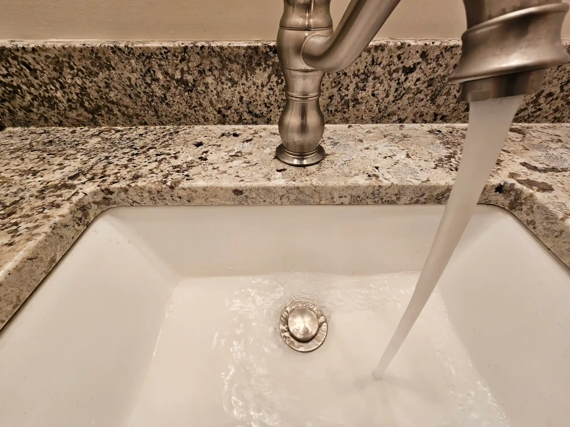 Silver bathroom faucet and sink