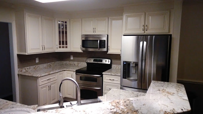 Southern Pines NC kitchen remodel with white cabinets and mixed countertop