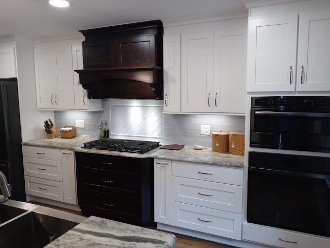 Black and white kitchen cabinets with black kitchen applicances for kitchen renovation
