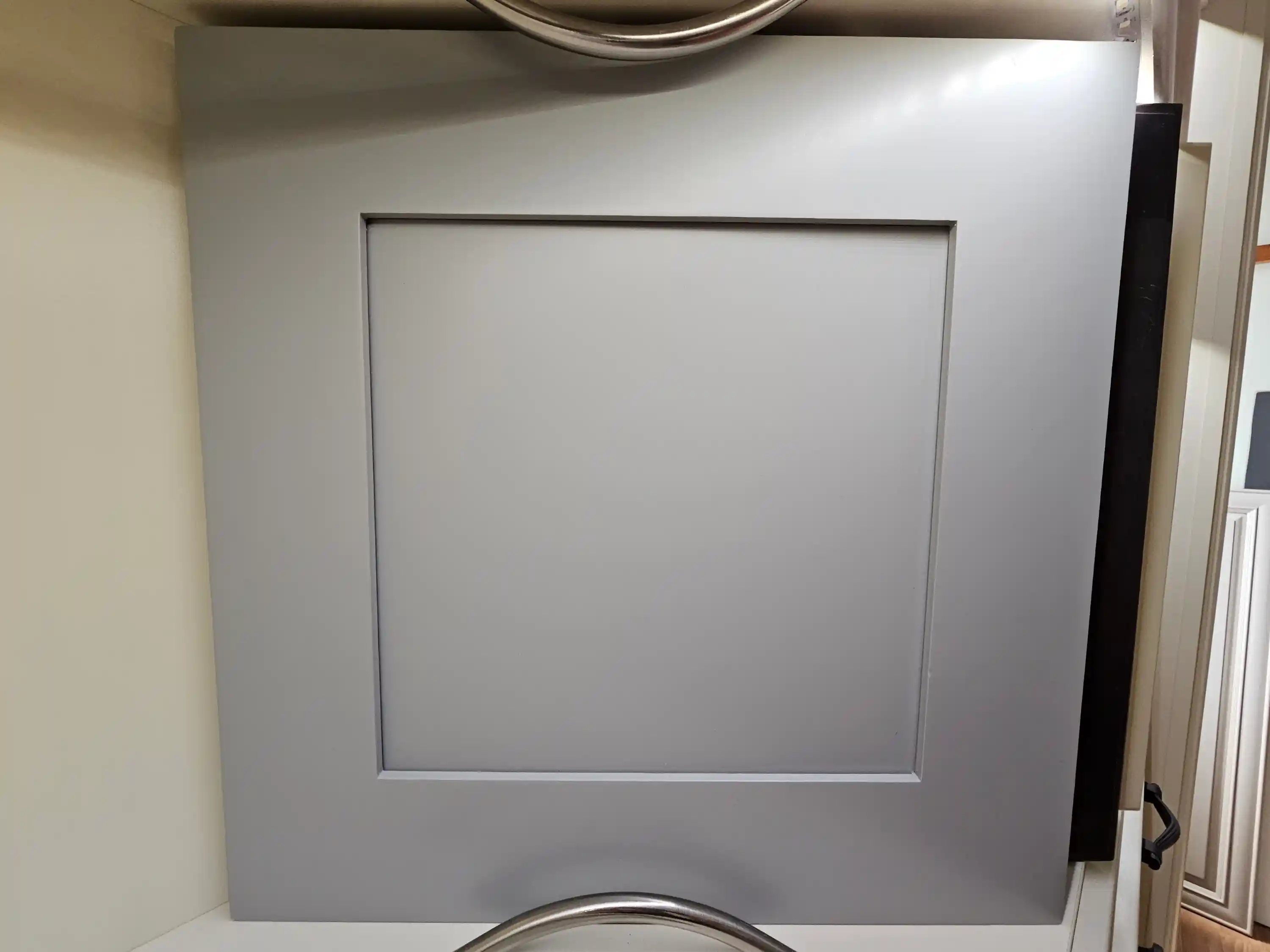 Light grey kitchen cabinet