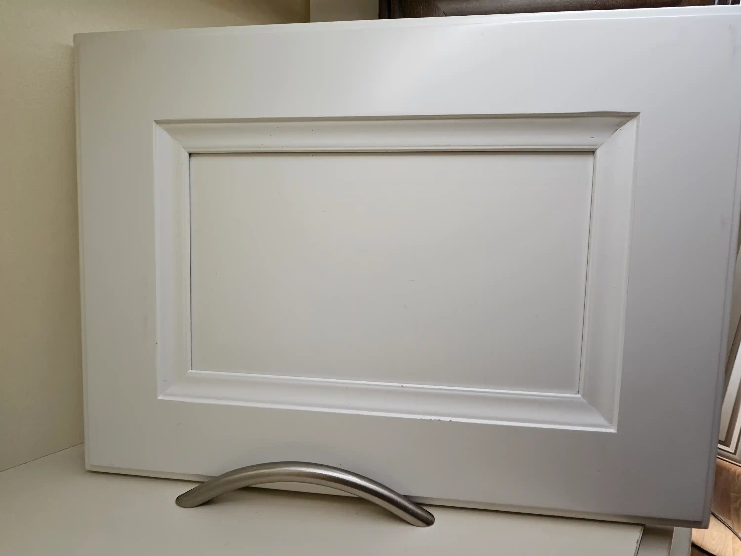 Plain white kitchen or bathroom cabinet