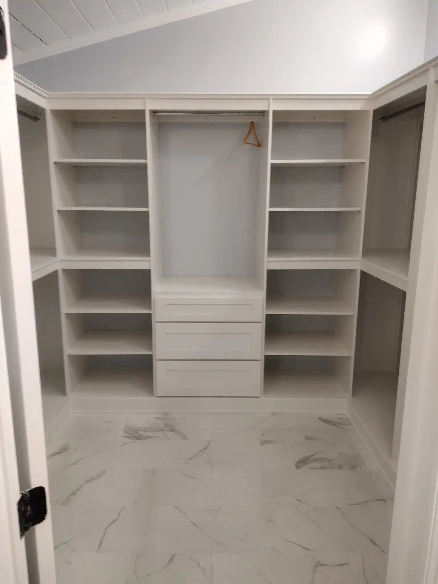 Custom closet connected to bathroom remodeling project in Knoxville.