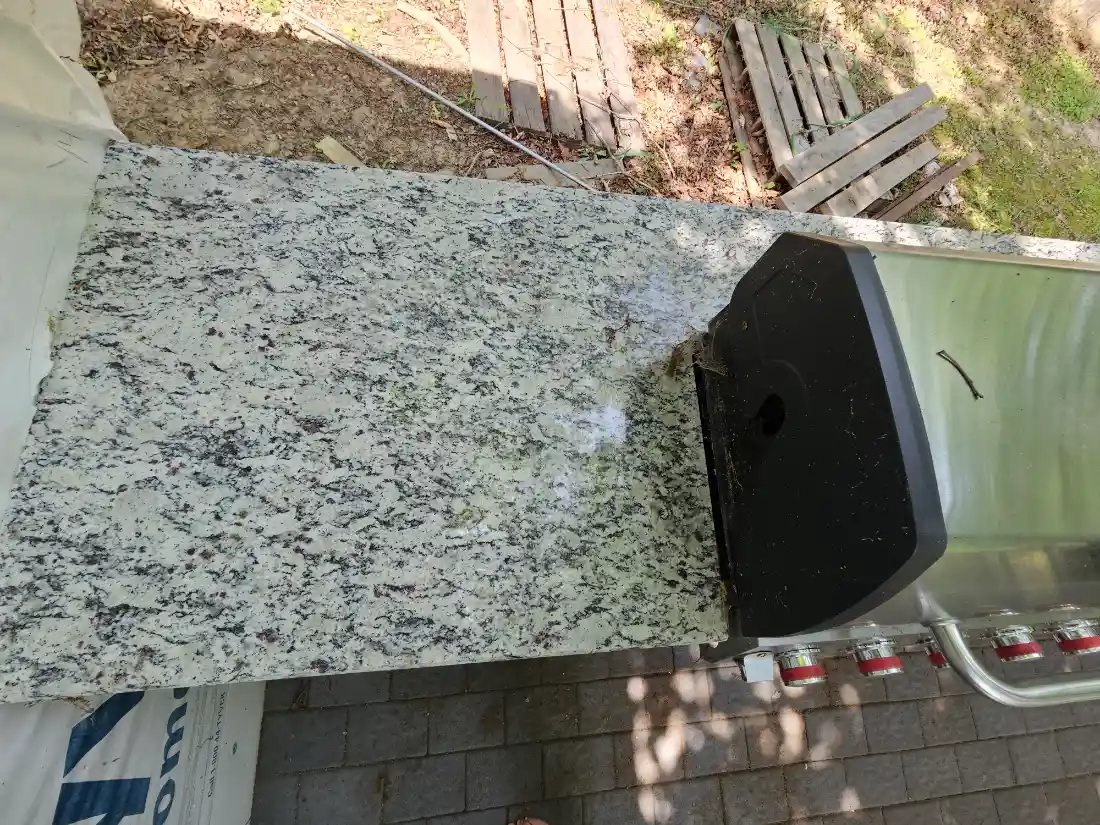Outdoor granite countertop that has been scratch and weather resistant for patio and grill.