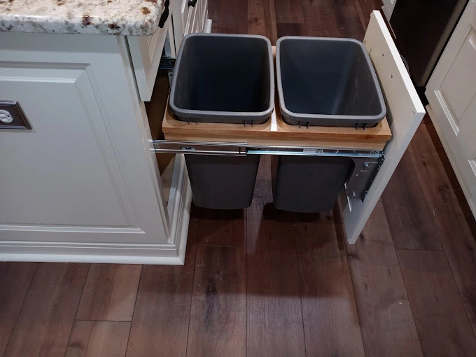 Trash can pull out for kitchen cabinets.