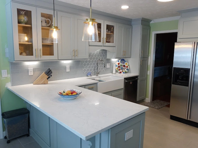 White kitchen countertop with sterling cabinets